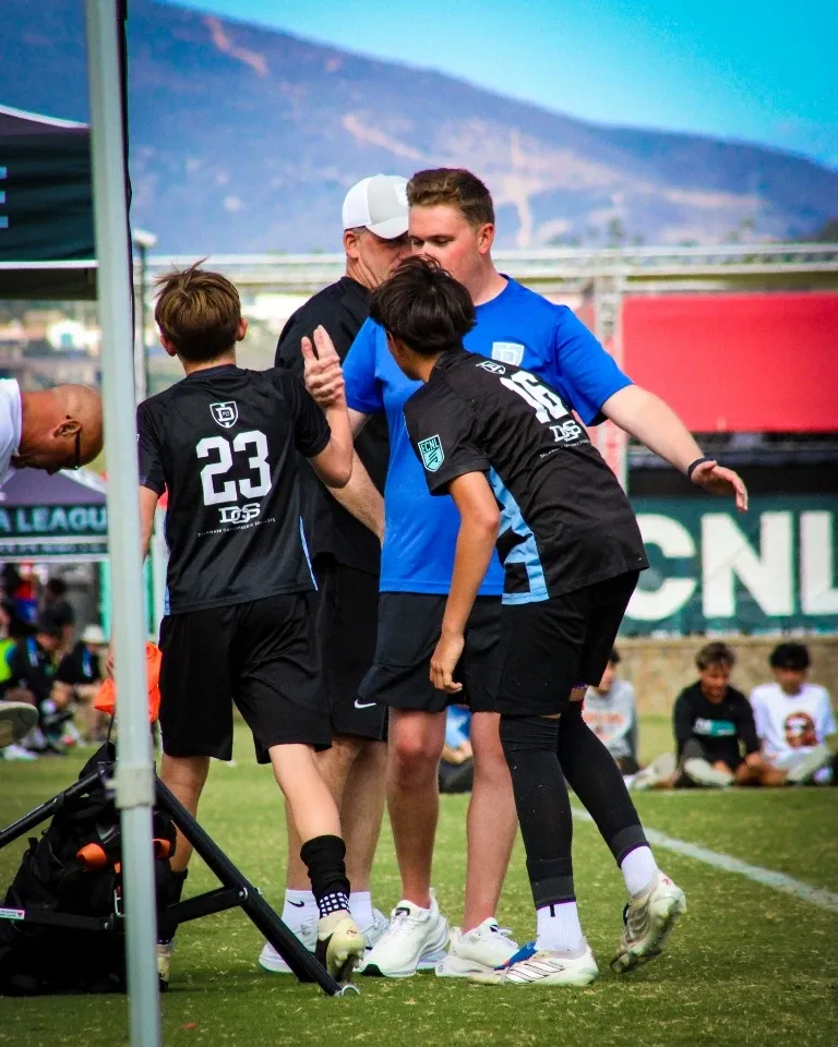 Delaware Orthopaedic Specialists trainer with youth soccer players