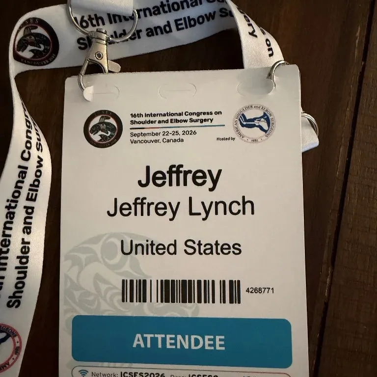 Conference attendee badge and lanyard